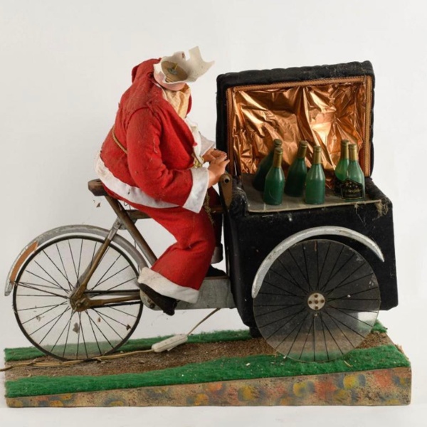 Le p&egrave;re no&euml;l sur son triporteur