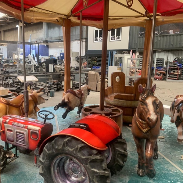 Carrousel à propulsion mécanique pour un restaurant à thème en Suisse